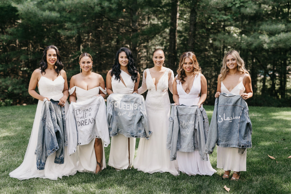 Luxury wedding in the Hamptons - bridesmaids with denim jackets